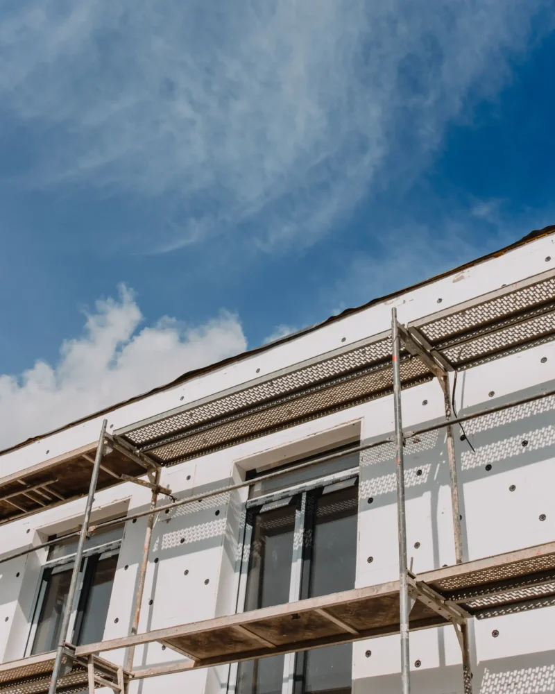 scaffolding-on-house-facade-modern-building-under-2025-02-10-11-15-03-utc